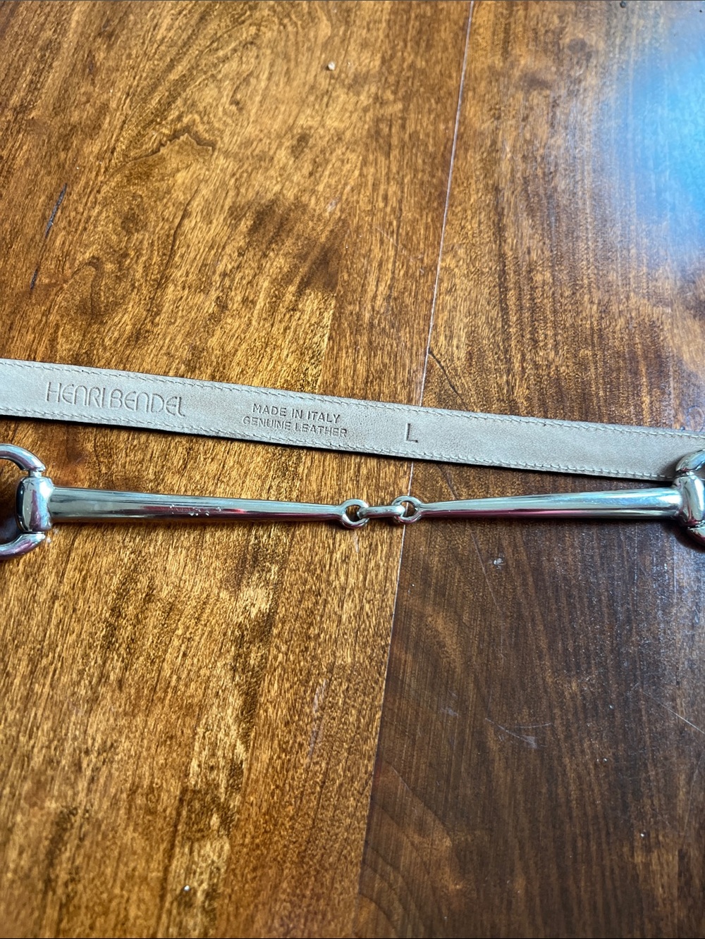 Henri Bendel beige leather belt with silver horsebit length is 38 inches